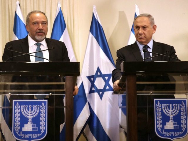 Israeli Prime Minister Benjamin Netanyahu (R) and Avigdor Lieberman (L), the head of hardl