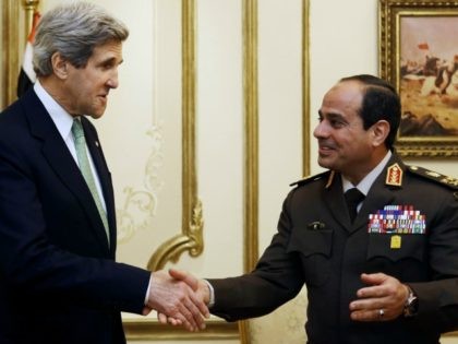 US Secretary of State John Kerry (L) shakes hands with General Abdel Fattah al-Sissi, Egyptian defence minister and commander of the armed forces, during a meeting at the defence ministry in Cairo on March 3, 2013.
