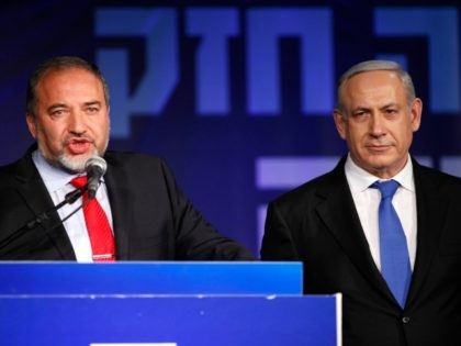 Israeli Prime Minister Benjamin Netanyahu and Former Israel Minister for Foreign Affairs Avigdor Liberman at his election campaign headquarters on Janurary 23, 2013 in Tel Aviv, Israel. Netanyahu was re-elected for a third term and will return to office, according to exit polls. Israel had the highest turnout of voters …