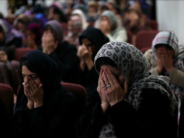 CHINO, CA - DECEMBER 03: Muslim women pray during a prayer vigil at Baitul Hameed Mosque o