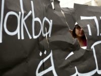 nakba day tel aviv An Israeli Arab student is seen through a torn placard during a ceremony commemorating the 'Nakba Day' in front of Tel Aviv university on May 14, 2012 which was organised by Arab Israelis and left-wing students.