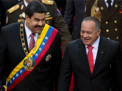 Venezuela's President Nicolas Maduro, left, shares a laugh with National Assembly Presiden