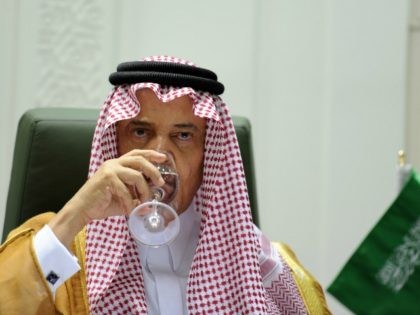 Saudi Foreign Minister Prince Saud bin al-Faisal drinks water during a joint press confere