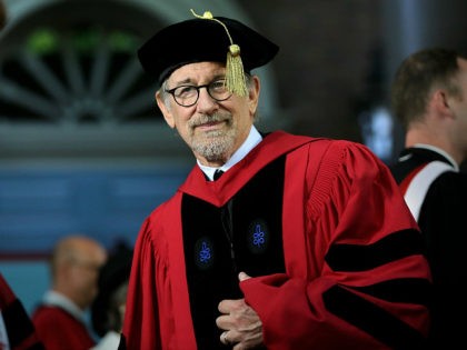 Filmmaker Steven Spielberg steps onto the stage during Harvard University commencement exe