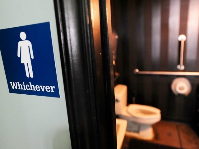DURHAM, NC - MAY 11: A gender neutral sign is posted outside a bathrooms at Oval Park Grill on May 11, 2016 in Durham, North Carolina. (Photo by Sara D. Davis/Getty Images) *** Local Caption *** House Bill 2