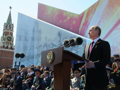 Russian President Vladimir Putin delivers a speech during the Victory Day military parade