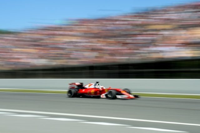 Ferrari's driver Sebastian Vettel competes at the Circuit de Catalunya on May 15, 2016 in