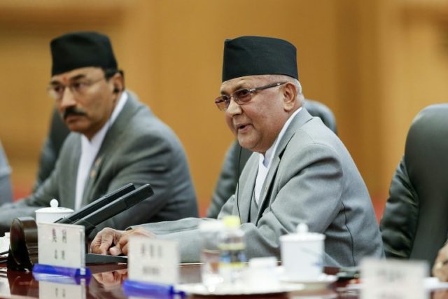 Nepal's parliament was thrown into chaos after Maoists threatened to pull out of the rulin