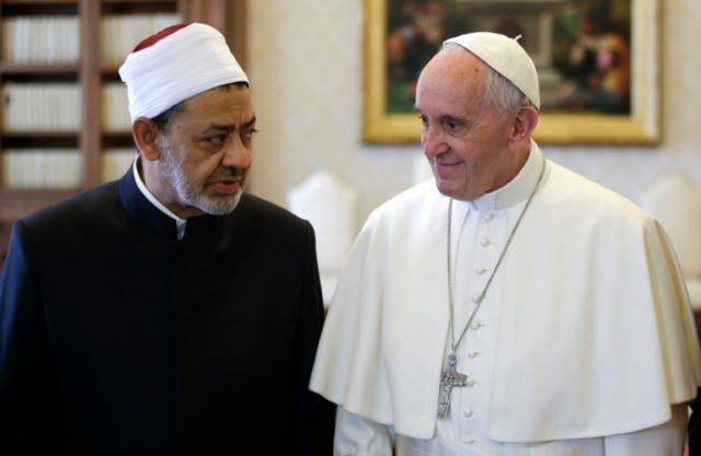 Pope Francis (right) talks with Al-Azhar's Grand Imam Ahmed al-Tayeb during a private audi