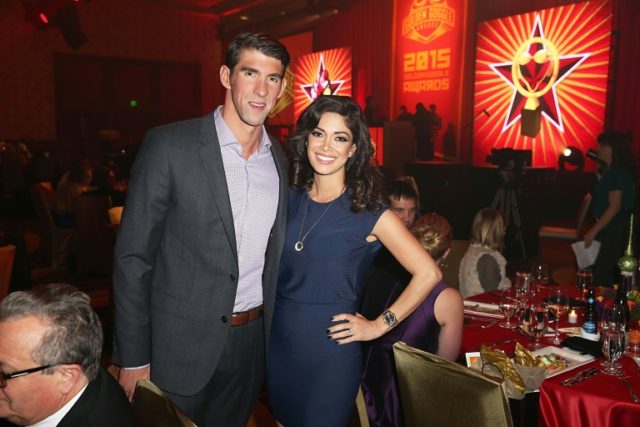 Michael Phelps (L) and Nicole Johnson, pictured on November 22, 2015, are now the parents