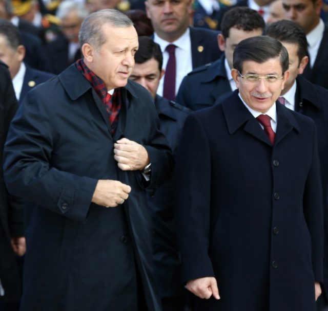 Turkish President Recep Tayyip Erdogan (left) and Prime Minister Ahmet Davutoglu visit the