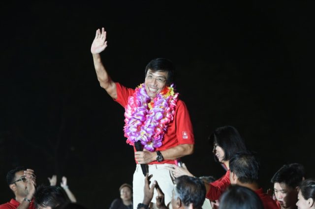 Singapore Democratic Party candidate Chee Soon Juan speaks to supporters after being defea