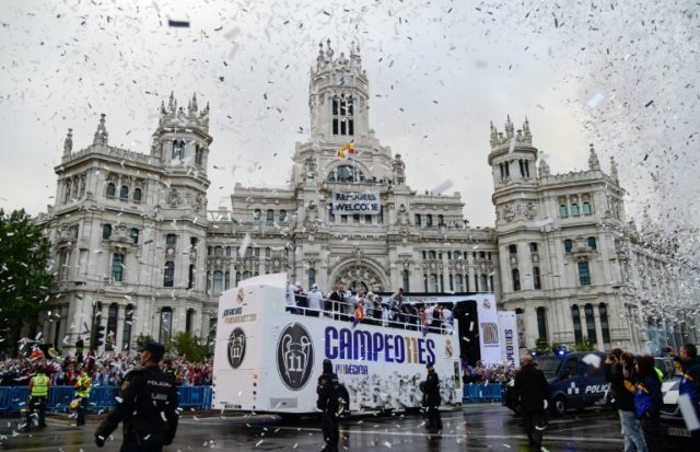 Real Madrid football players arrive to celebrate the team's win on Plaza Cibeles in Madrid