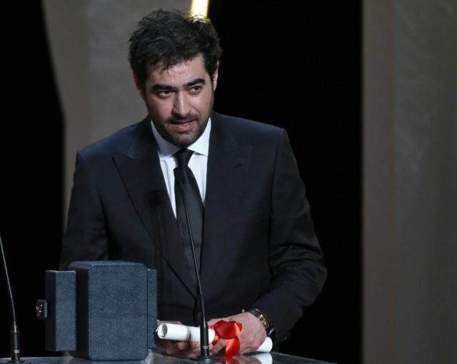 Iranian actor Shahab Hosseini talks on stage after being awarded with the Best Actor prize