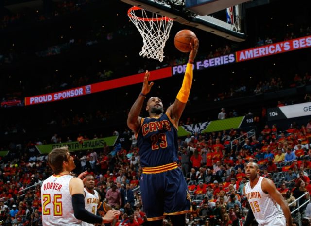 LeBron James #23 of the Cleveland Cavaliers lays in a basket against the Atlanta Hawks in