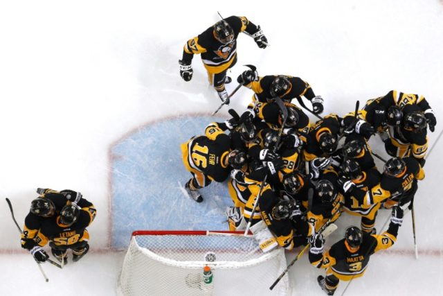 The Pittsburgh Penguins celebrate after defeating the Tampa Bay Lightning in Game Seven of