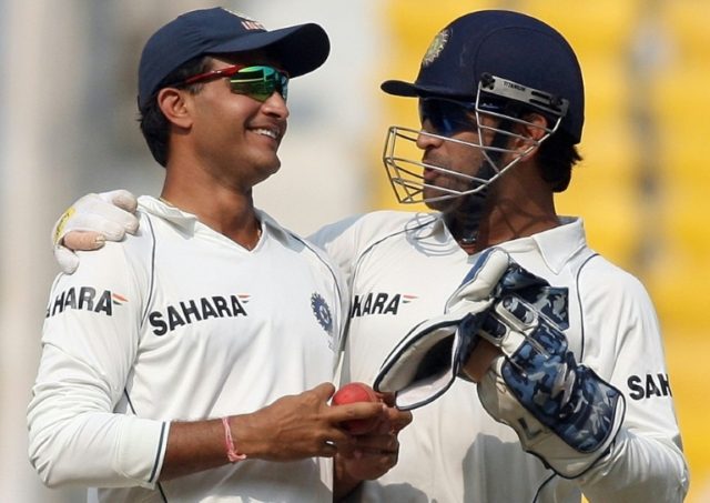 India's Sourav Ganguly (left) speaks to Mahendra Singh Dhoni during a 2008 Test match agai