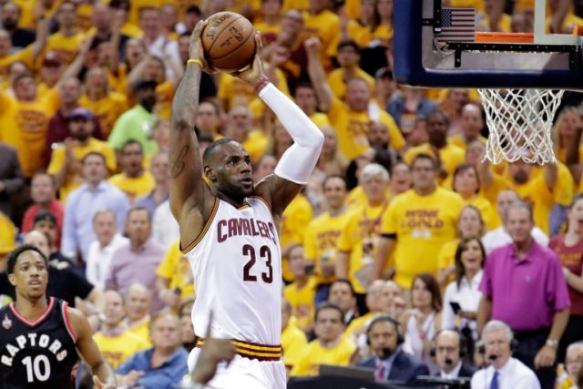 LeBron James of the Cleveland Cavaliers goes up for a dunk against the Toronto Raptors in
