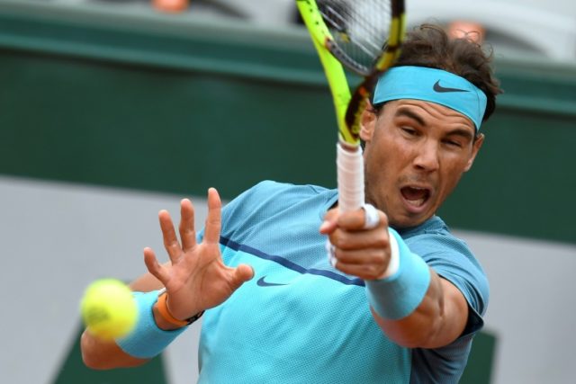 Spain's Rafael Nadal in action against Australia's Samuel Groth during their first round m