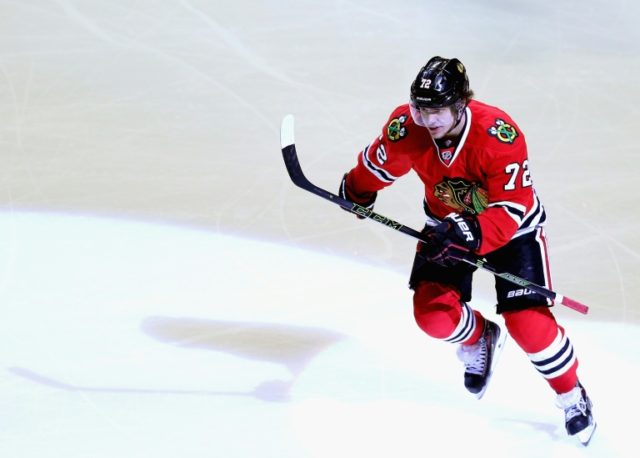 Artemi Panarin of the Chicago Blackhawks skates to the bench after scoring a goal during a