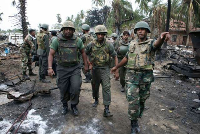 Sri Lankan government soldiers on the frontline during the war against the Tamil Tigers ne