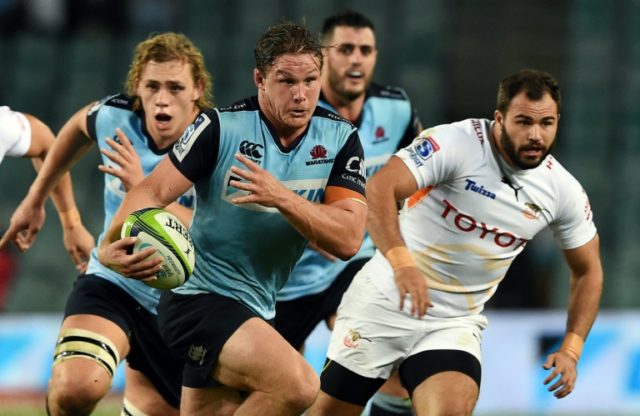 New South Wales Waratahs Michael Hooper leads the charge against the Central Cheetahs duri