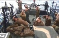 The US Navy said Commander Eric Rasch, who commanded the sailors briefly captured by Iran in January (pictured), had been relieved of command and reassigned