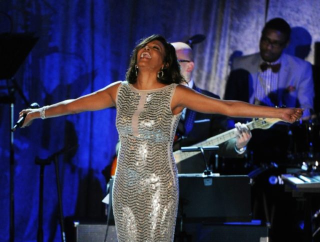 Singer Whitney Houston performs onstage during the 2011 Pre-Grammy Gala & Salute to In
