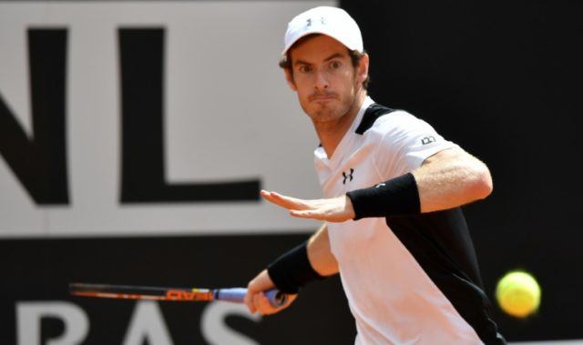 Andy Murray hits a return to David Goffin during their Rome Master quarter-final match on