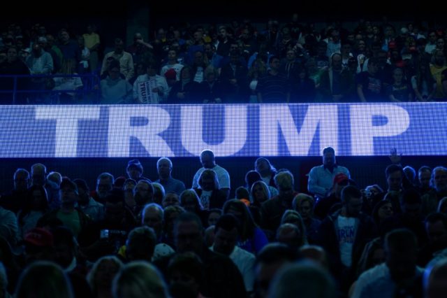 People wait for a rally for US Republican presidential candidate Donald Trump on May 5, 20
