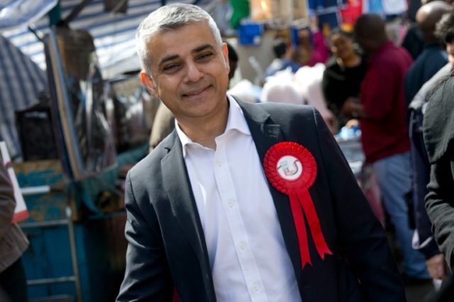 Labour party candidate for London Mayor Sadiq Khan reacts as he canvasses for supporters a