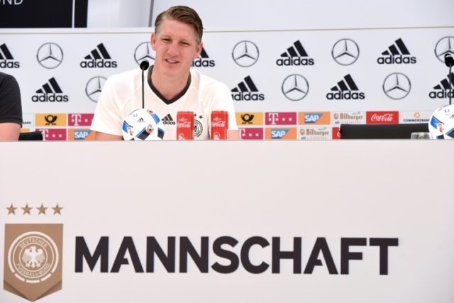 Germany's Bastian Schweinsteiger tells a press conference he is "confident" as the team pr