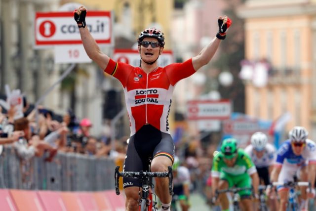 German cyclist Andre Greipel celebrates as he crosses the finish line at the end of the fi