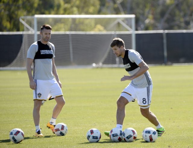 Steven Gerrard and Robbie Keane of the Los Angeles Galaxy train at StubHub Center in Carso
