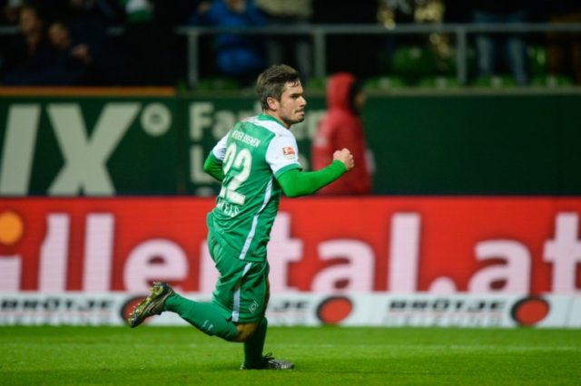 Bremen's midfielder Fin Bartels celebrates after scoring a goal during a football match in
