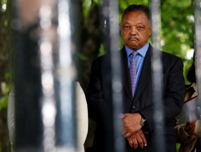 Reverend Jesse Jackson looks on during a ceremony at the Luxembourg Gardens to mark the an
