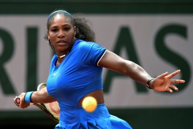 Serena Williams returns the ball to Kristina Mladenovic during their women's third round m