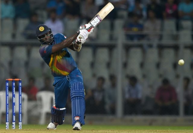 Sri Lanka's Angelo Mathews plays a shot during a warm up World T20 cricket tournament matc