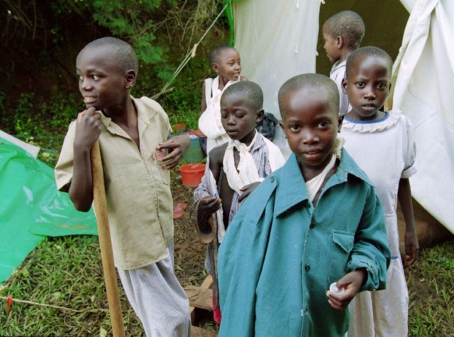 Tutsi children, who were mutiliated by machetes in Rwanda's civil war, rest in the Interna