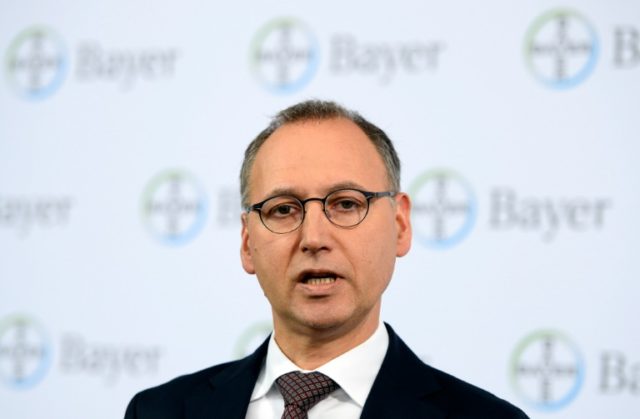 Bayer CEO Werner Baumann, pictured on May 23, 2016, is offering $122 per share in cash for
