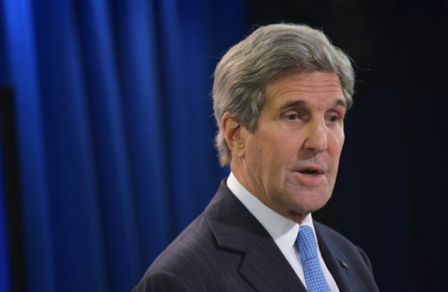US Secretary of State John Kerry answers a question on Syria while speaking in the briefin