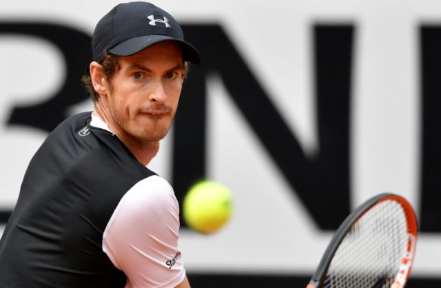 Britain's Andy Murray hits a return against France's Lucas Pouille during the ATP Tennis O
