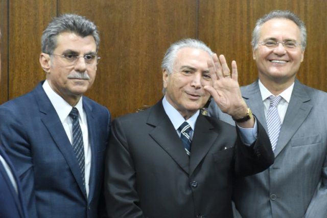 Brazilian acting President Michel Temer (C), Senate's President Renan Calheiros (R) and Pl