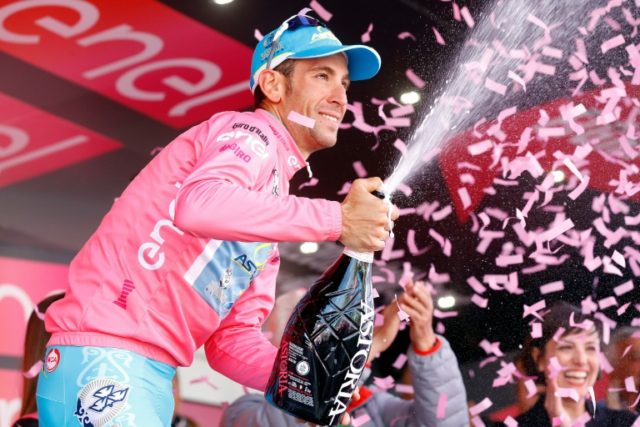 Vincenzo Nibali celebrates the pink jersey on the podium of the 20th stage of the Giro d'I