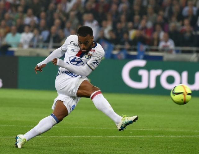 Lyon's forward Alexandre Lacazette shoots the ball on May 7, 2016