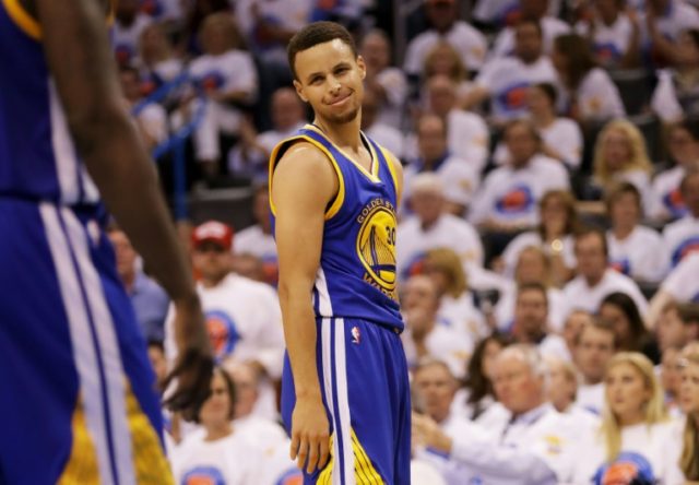 Stephen Curry #30 of the Golden State Warriors reacts in the third quarter against the Okl