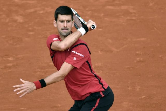 Serbia's Novak Djokovic eased through his first round at the French Open with a straight s