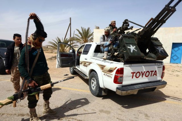 Members of forces loyal to Libya's Islamist-backed parliament General National Congress pr