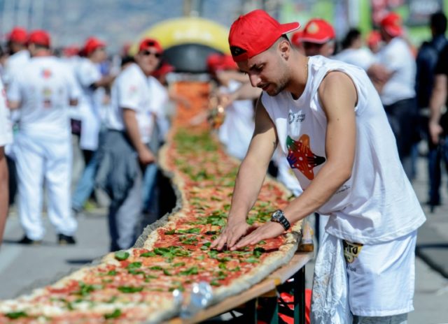 The record-breaking pizza measured up at exactly 1,853.88 metres (6,082 feet)