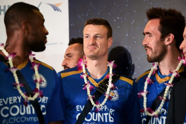 Robert Huth shares a look with his teammates as Leicester City players arrive for two days